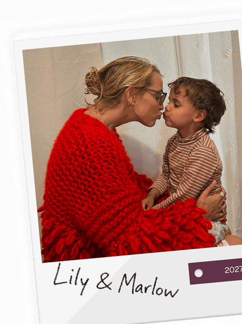 A keepsake photo of a mother and child, dated 2027